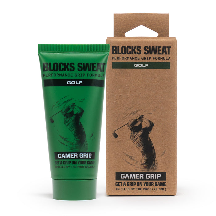 Green Gamer Grip for Golf 1 oz tube next to its kraft retail box, both reading Blocks Sweat Performance Grip Formula